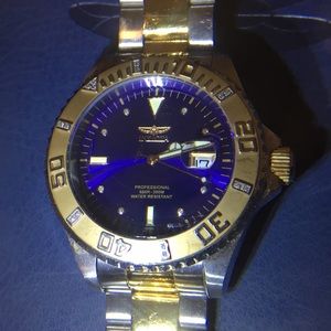 Invicta women’s watch.  Swiss made with diamonds.